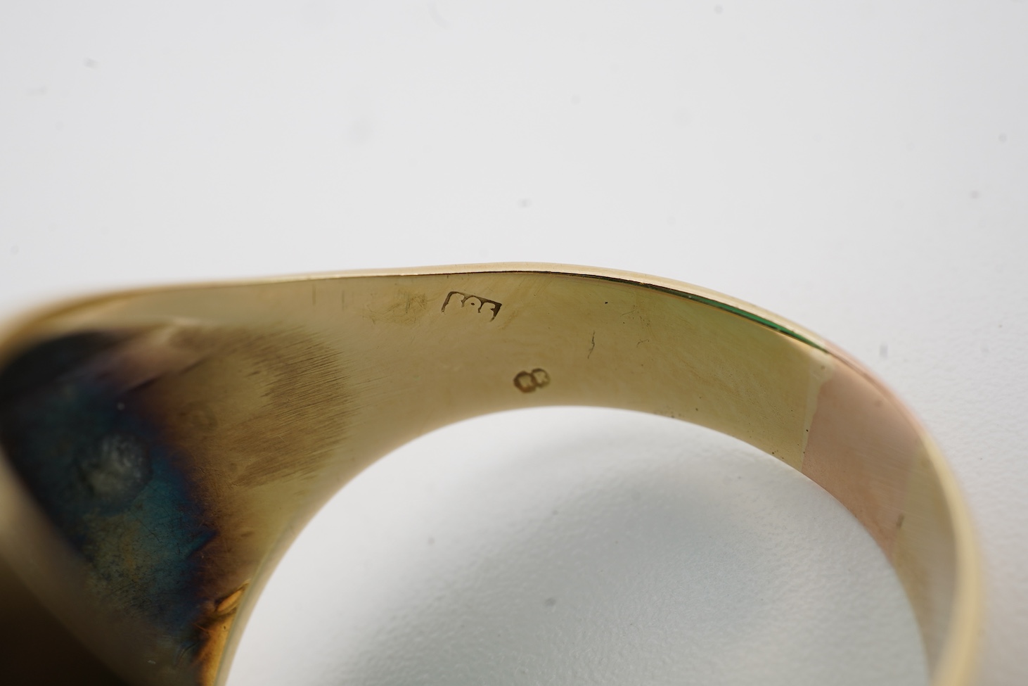A yellow metal (stamped 585) and single stone oval chrysoprase set signet ring, size U, gross weight 8.4 grams.